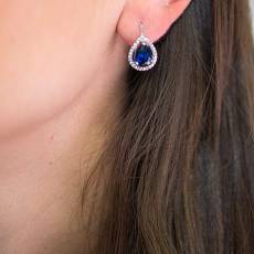 Ασημένια 925 σκουλαρίκια ροζέτες με μπλε ζιργκόν 034022
